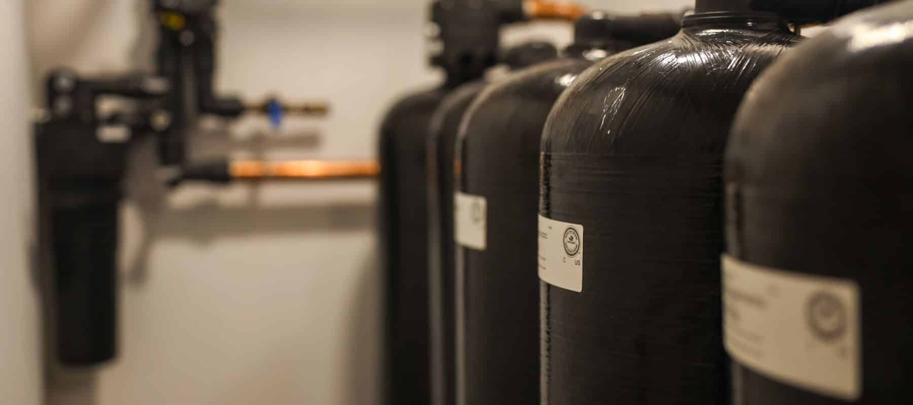 kinetico water softeners lined up